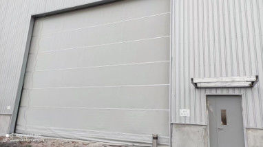 kaufen Betriebstemperaturbereich minus 30 Grad Celsius bis plus 60 Grad Celsius Vertikale Hubtore aus Gewebe mit Hinderniserkennung Not-Aus und maximaler Höhe 12 Meter online manufacture